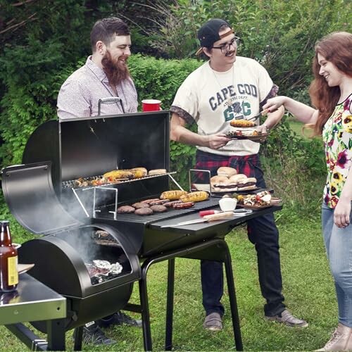 Three people grilling food at a backyard BBQ.