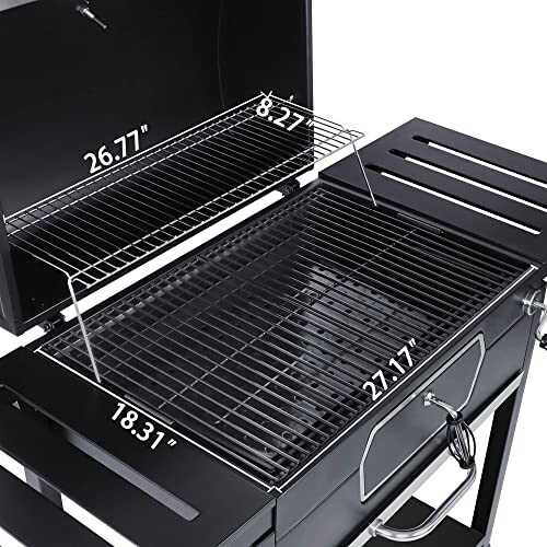 Open charcoal grill showing cooking grates with dimensions