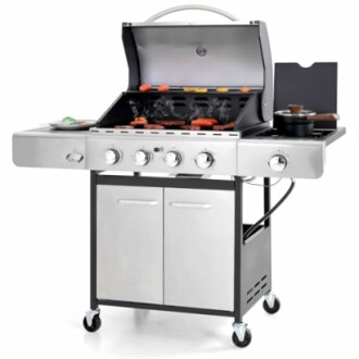 Outdoor gas grill with multiple burners and food cooking.